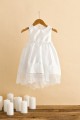 Βαπτιστικό φόρεμα με λευκό ύφασμα και δαντελένια λευκή τρέσσα